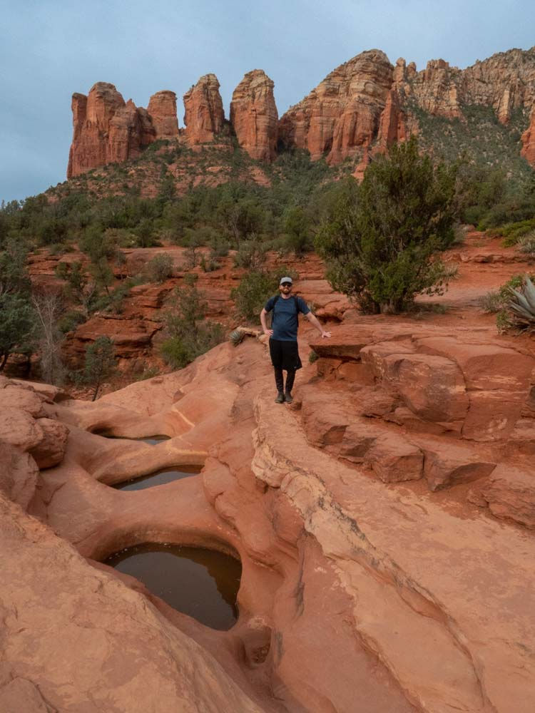 Man standing near the Seven Sacred Pools in Sedona