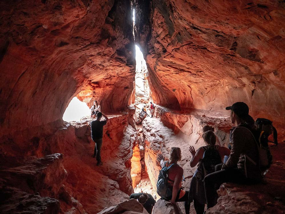 Hikers in the hidden Soldiers Pass Cave